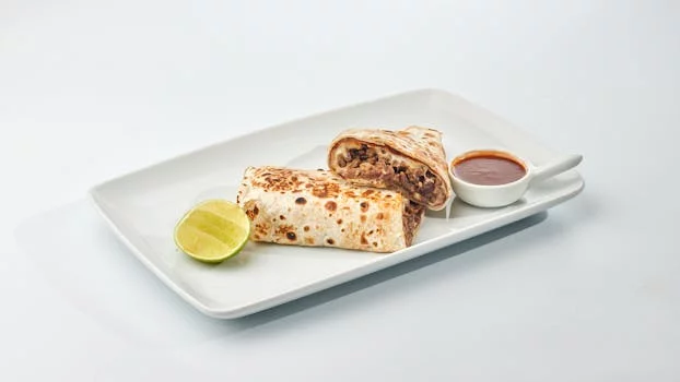 barbacoa beef burrito with rice beans