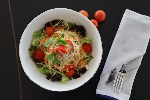 tostada salad lettuce tomatoes cheese tortilla bowl