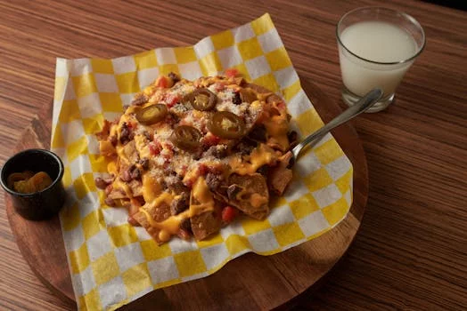 nachos cheese jalapenos beans sour cream